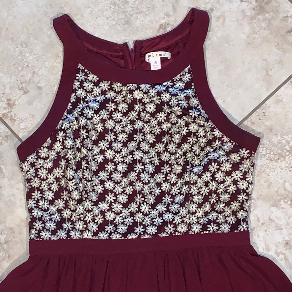Maroon dress with flowers on top